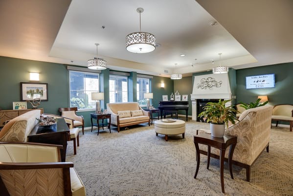 Cozy common area with seating and piano