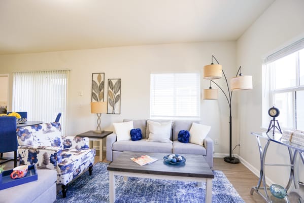 Bright and inviting common area with seating and decor