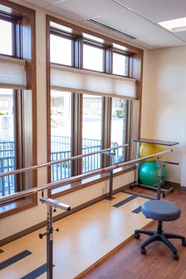 Rehabilitation area with exercise equipment and natural light