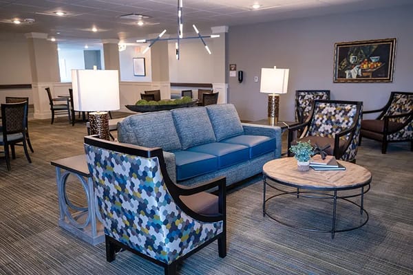 Bright common area with comfortable seating and decor