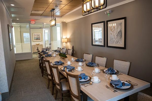 Dining area set for a meal with elegant decor