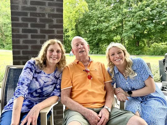 Residents and staff enjoying time outdoors together