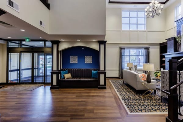 Bright lobby area with seating and decor