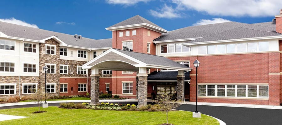 Exterior view of a senior living facility entrance