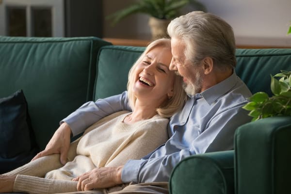 Couple enjoying time together on a couch
