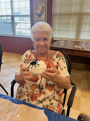 Resident participating in a crafting activity
