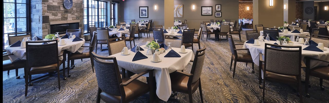 Elegant dining room setup with tables and decor