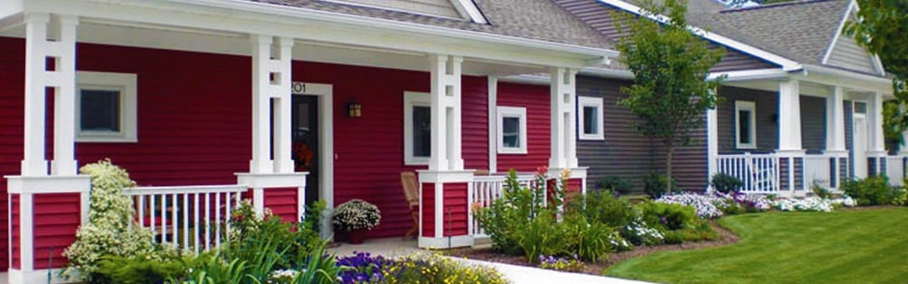 Colorful building exteriors with gardens and pathways