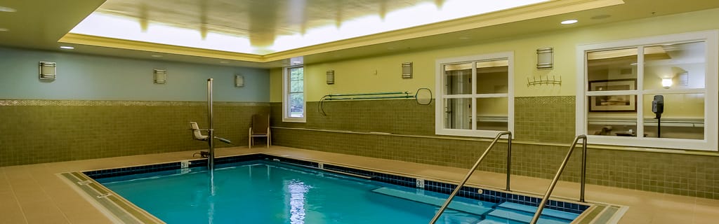 Indoor pool area with accessibility features