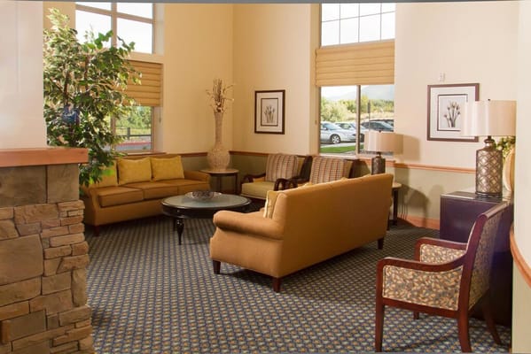 A cozy common area with seating and decor