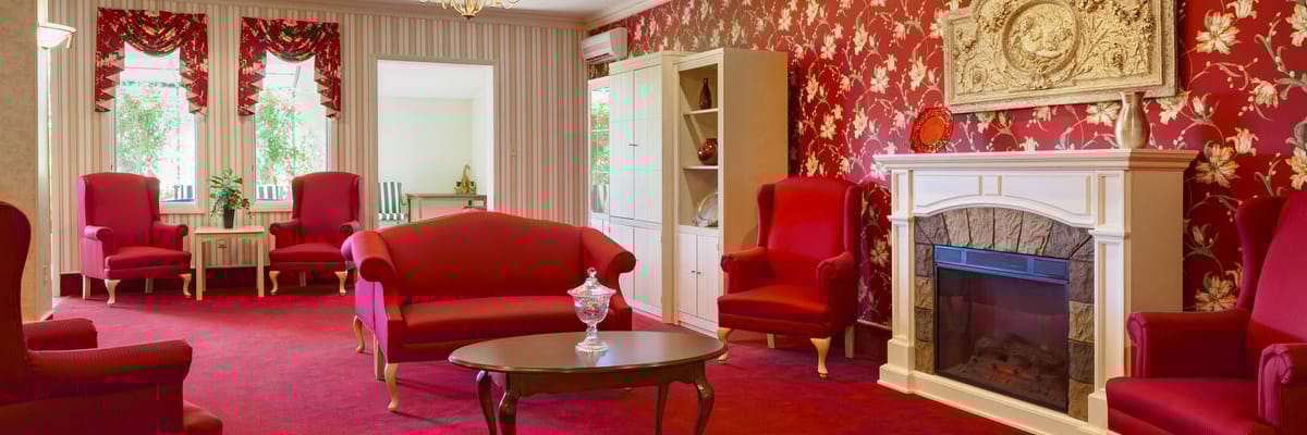 Interior of a cozy lounge area with red decor