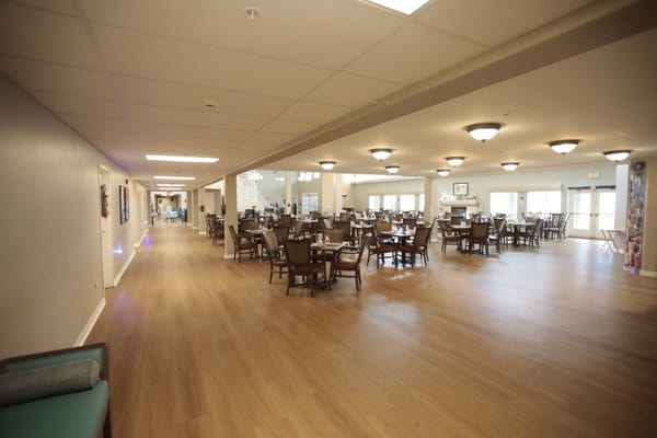 Dining room with tables and chairs in the facility