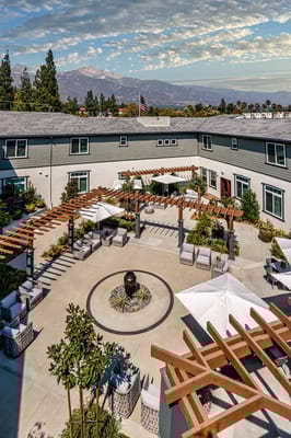 Beautiful outdoor courtyard with seating and pergolas