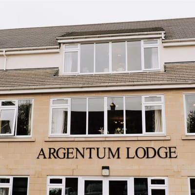 Exterior view of Argentum Lodge with name signage