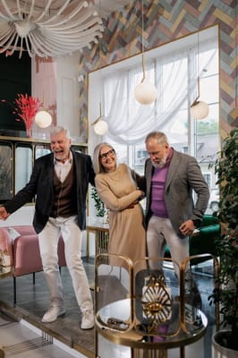 Residents and staff enjoying a lively moment in a common area