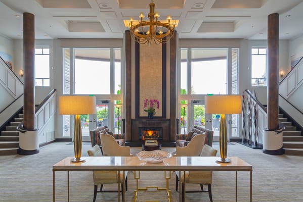 Bright, welcoming lobby area with a fireplace