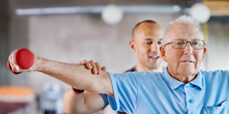 Elderly man participating in physical therapy session