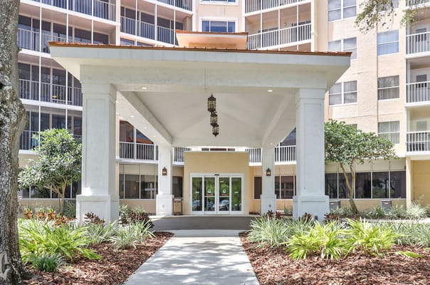 Entrance of a retirement community with landscape features