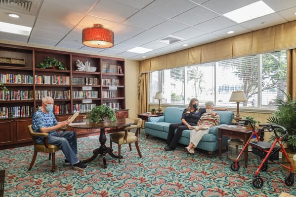 Residents enjoying a cozy common area in the facility