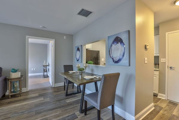 A cozy dining setup in a modern assisted living unit