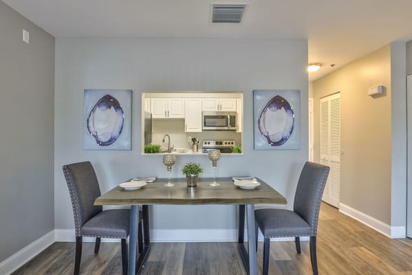 Interior view of a dining area with a table and chairs