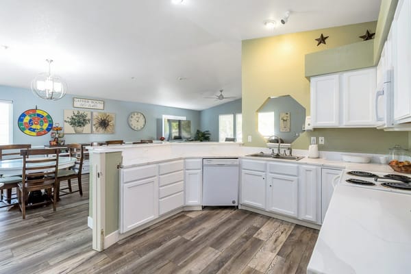 Bright kitchen and dining area in a senior living facility