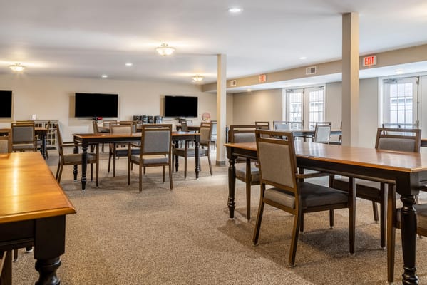 Interior view of a common area with tables and chairs