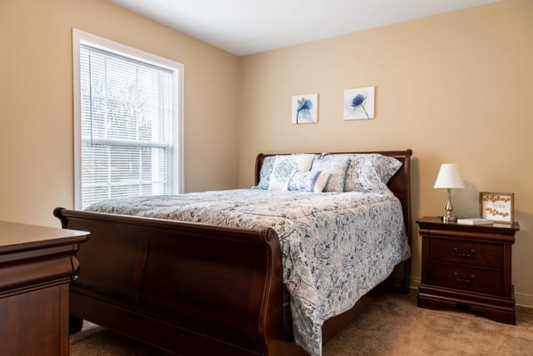 Cozy room with a bed and light decor