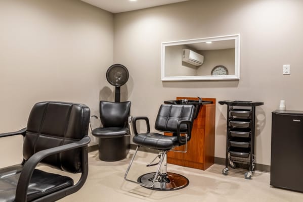 Interior view of a hair salon with styling chairs