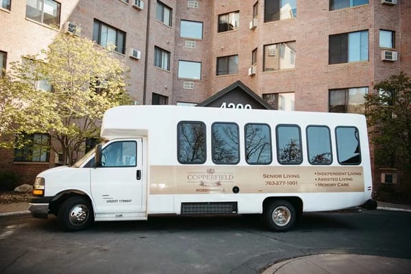 Facility transport van parked outside Copperfield Hill