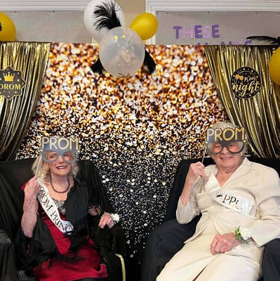 Two residents celebrating prom night with decorations