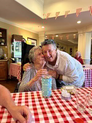 Residents enjoying a warm moment in the common area.