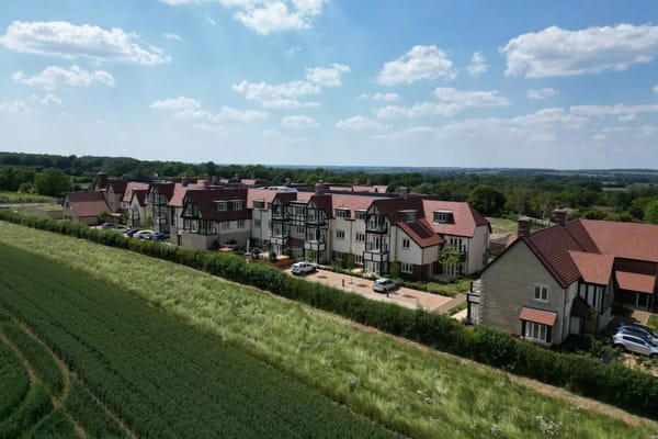 Aerial view of Elderswell Retirement Village with green fields