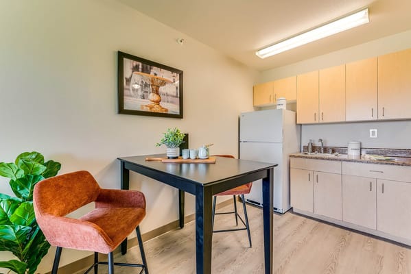 Bright kitchenette area in a resident unit
