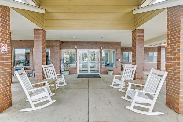 Outdoor sitting area with rocking chairs