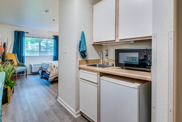 Cozy kitchenette area in a resident room
