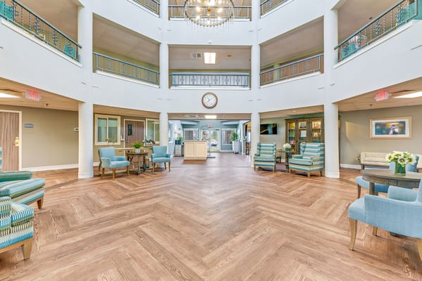 Interior view of a spacious common area with seating