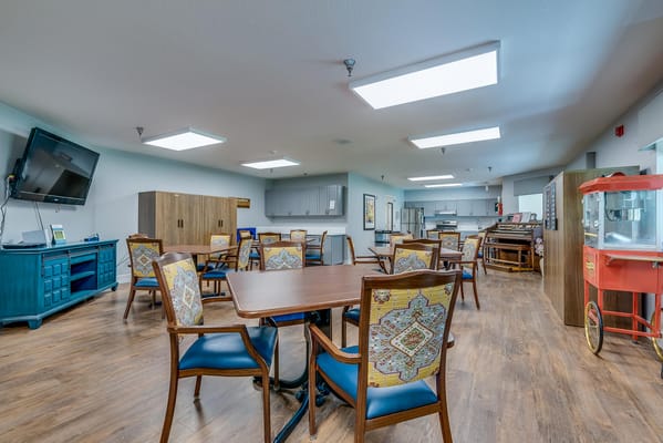Interior view of a common area with tables and chairs