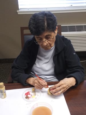 Resident engaged in a craft activity