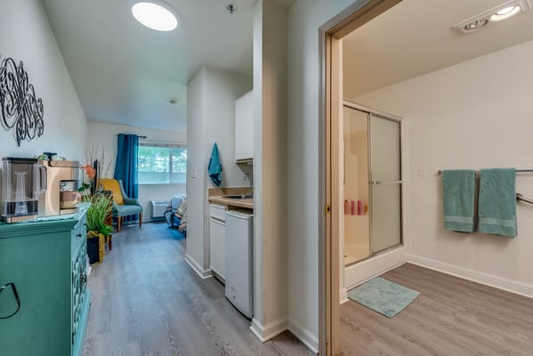 Interior view of a resident's room and bathroom