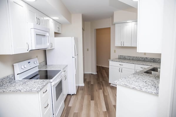 Bright, modern kitchen in a residential suite