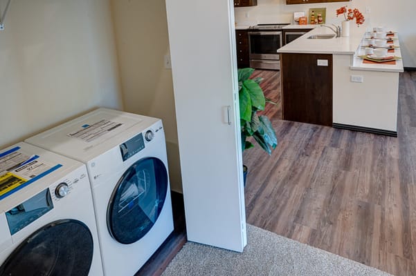 Inside view of a kitchen and laundry area