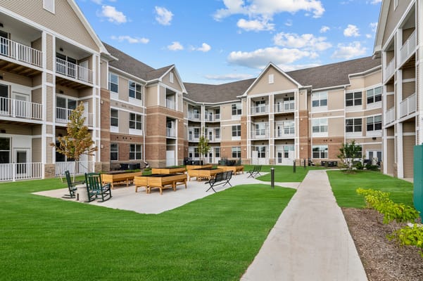 Outdoor courtyard with seating and greenery