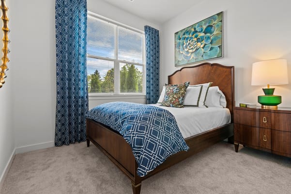 Brightly decorated private resident room with floral accents