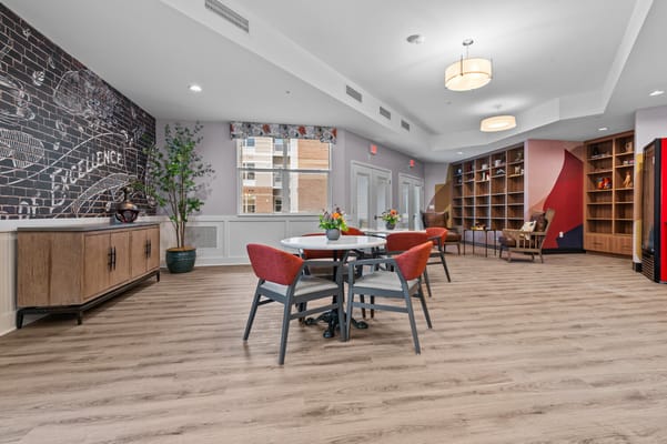 Bright common area with seating and decor