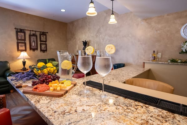 Refreshing drinks and snacks on a counter in a communal area
