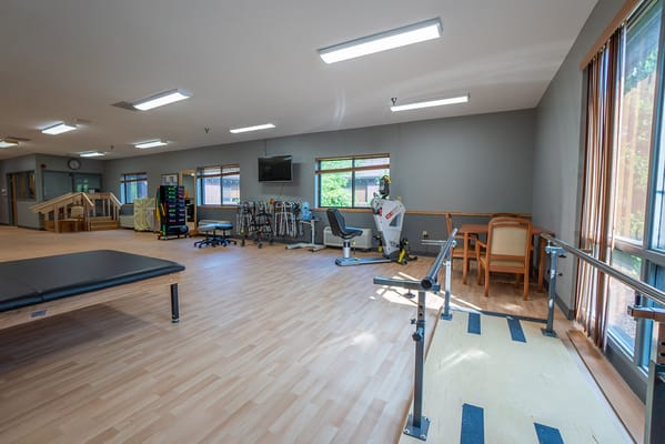 Interior view of a therapy room with equipment