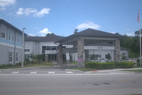 Exterior view of HearthStone at Nona Lakes facility