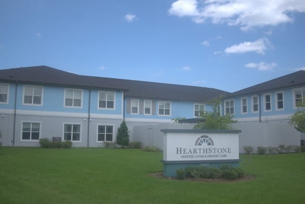 Exterior view of HearthStone at Nona Lakes facility