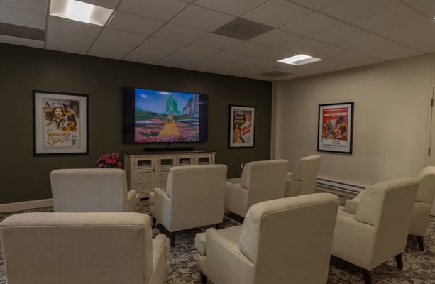 Cozy common area with movie posters and seating
